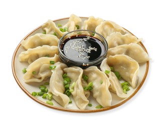 Photo of Tasty boiled gyoza (dumplings) with green onion and soy sauce on white background