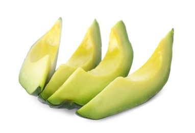 Photo of Pieces of ripe avocado isolated on white