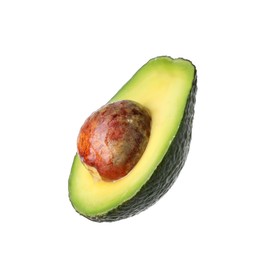 Photo of Half of ripe avocado in air isolated on white