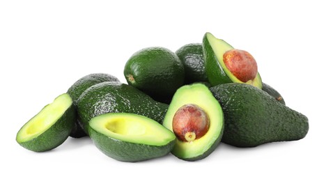 Photo of Many whole and cut avocados isolated on white