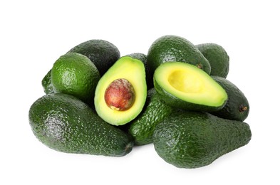 Photo of Many whole and cut avocados isolated on white