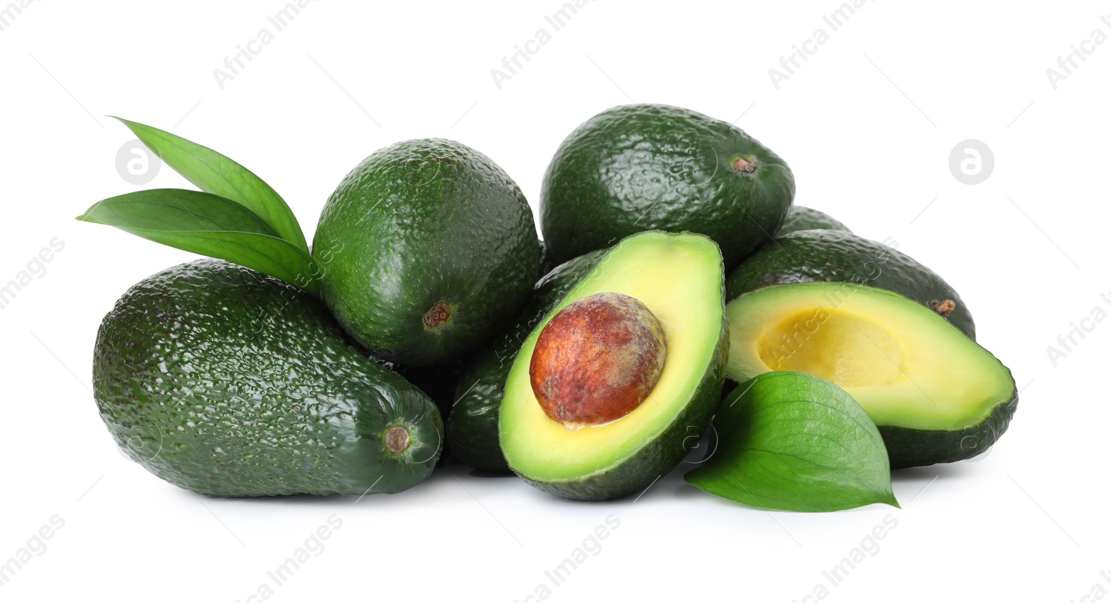 Photo of Many whole and cut avocados isolated on white