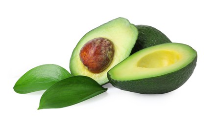 Photo of Whole and cut avocados isolated on white