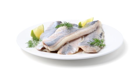 Marinated herring fillets with lime and dill isolated on white