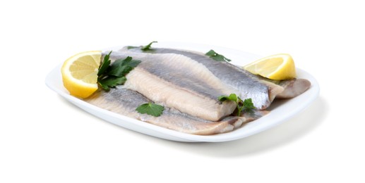 Photo of Marinated herring fillets with lemon and parsley isolated on white