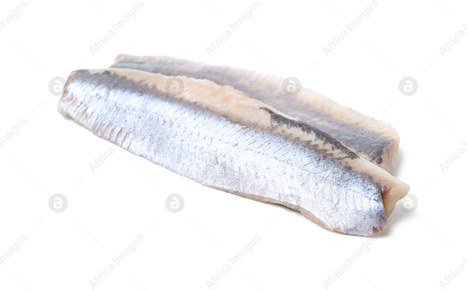 Photo of Tasty marinated herring fillets isolated on white