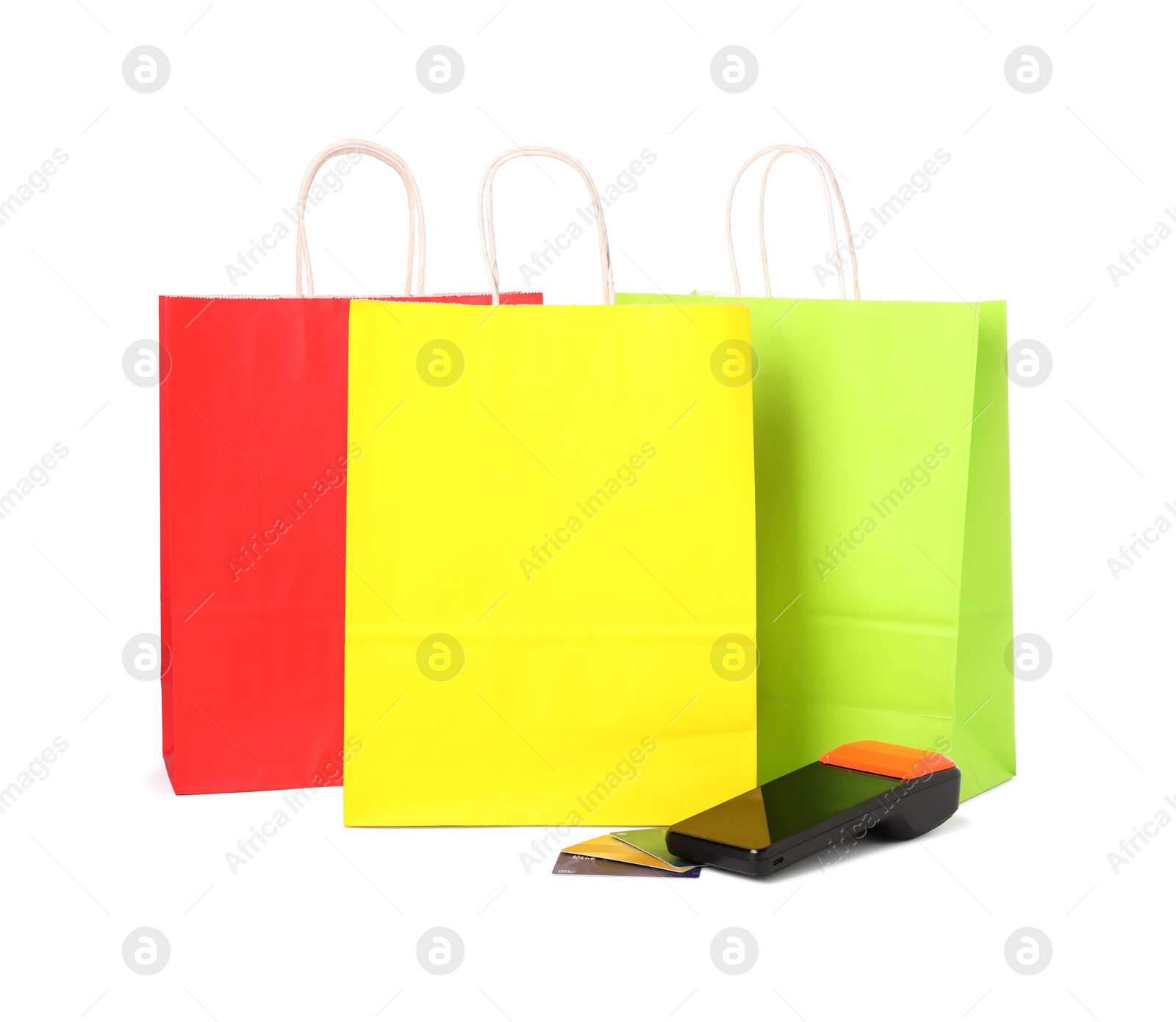 Payment terminal, shopping bags and credit cards isolated on white Photo of Payment terminal, shopping bags and credit cards isolated on white