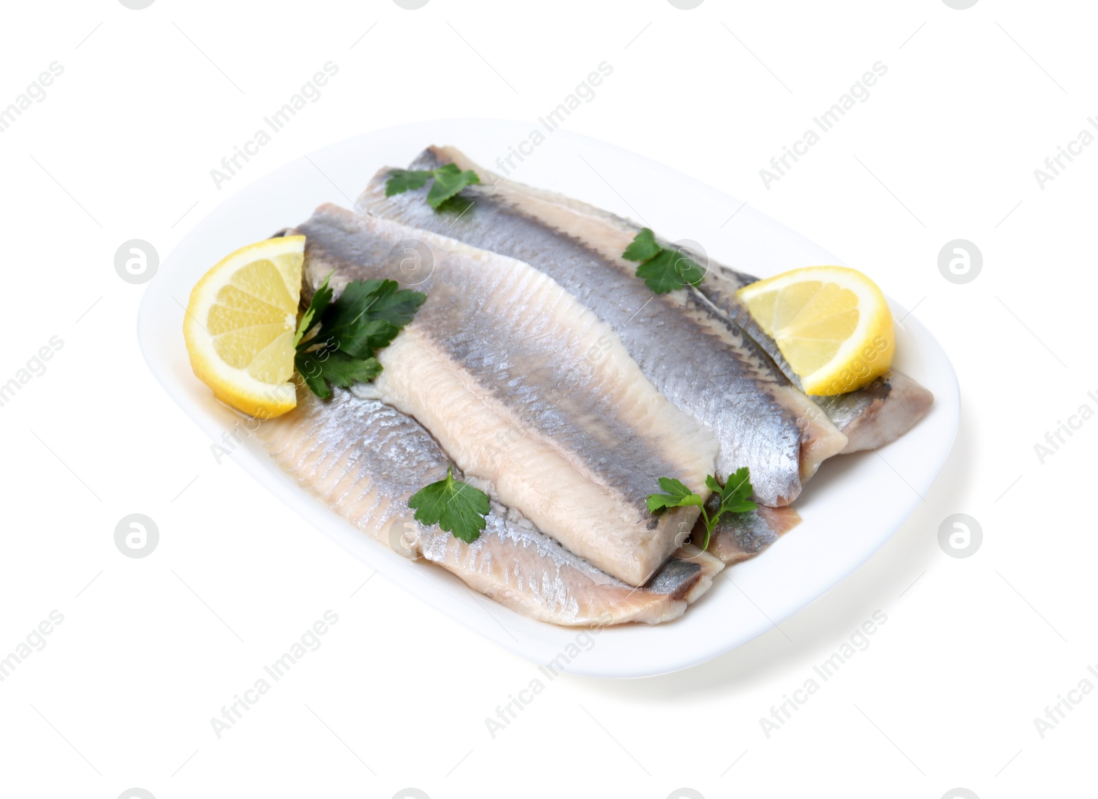 Photo of Marinated herring fillets with lemon and parsley isolated on white