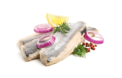 Marinated herring fillets with dill, onion rings, peppercorns and lemon isolated on white