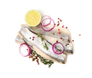 Photo of Marinated herring fillets with thyme, onion rings, peppercorns and lime isolated on white, top view