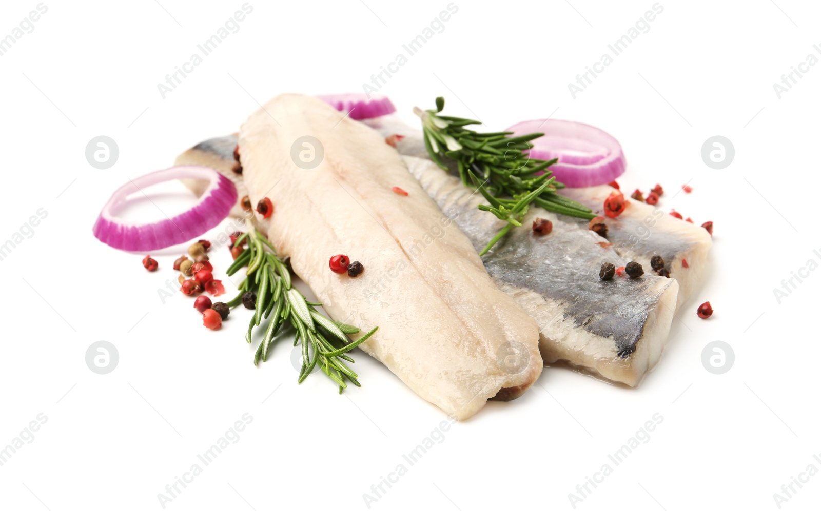 Photo of Marinated herring fillets with rosemary, onion rings and peppercorns isolated on white