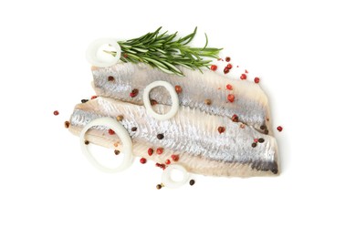 Marinated herring fillets with rosemary, onion rings and peppercorns isolated on white, top view