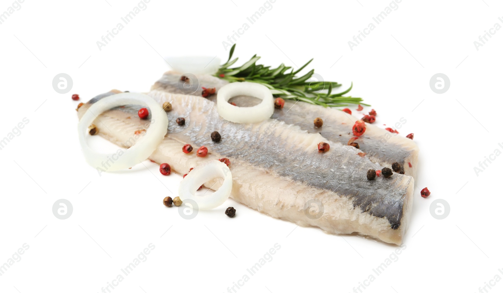 Photo of Marinated herring fillets with rosemary, onion rings and peppercorns isolated on white