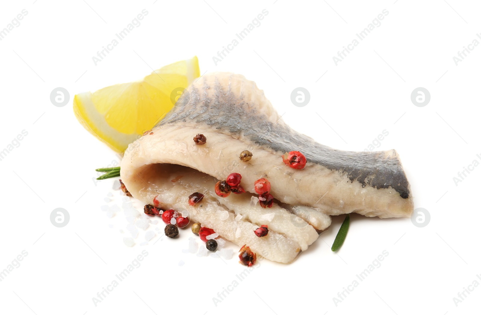 Photo of Marinated herring fillet with rosemary, salt, peppercorns and lemon isolated on white