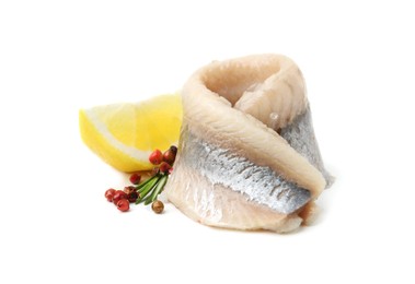 Marinated herring fillet with rosemary, peppercorns and lemon isolated on white