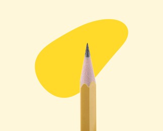 Image of Creative poster. Pencil and golden blot on light yellow background