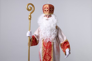 Photo of Saint Nicholas with crozier on light grey background