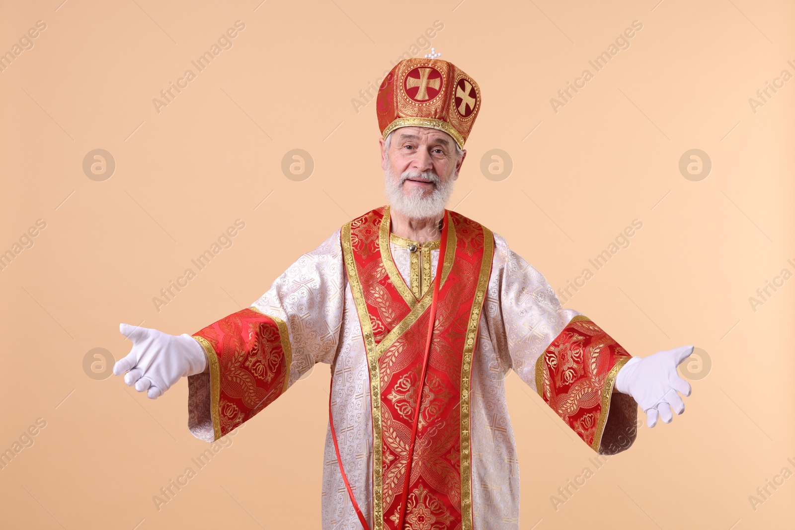 Photo of Portrait of happy Saint Nicholas on beige background