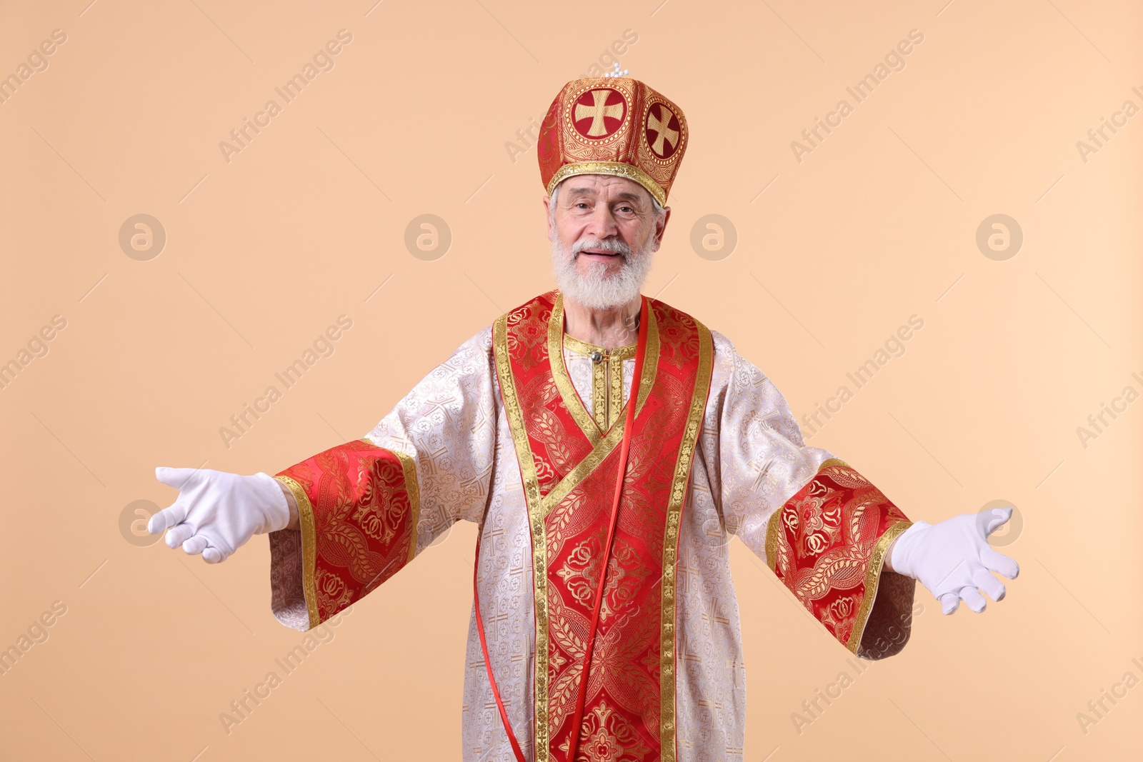 Photo of Portrait of happy Saint Nicholas on beige background