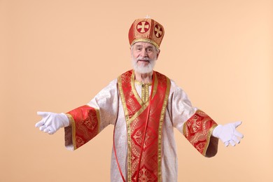 Portrait of happy Saint Nicholas on beige background