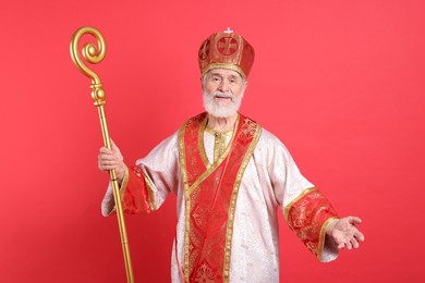 Photo of Saint Nicholas with crozier on red background