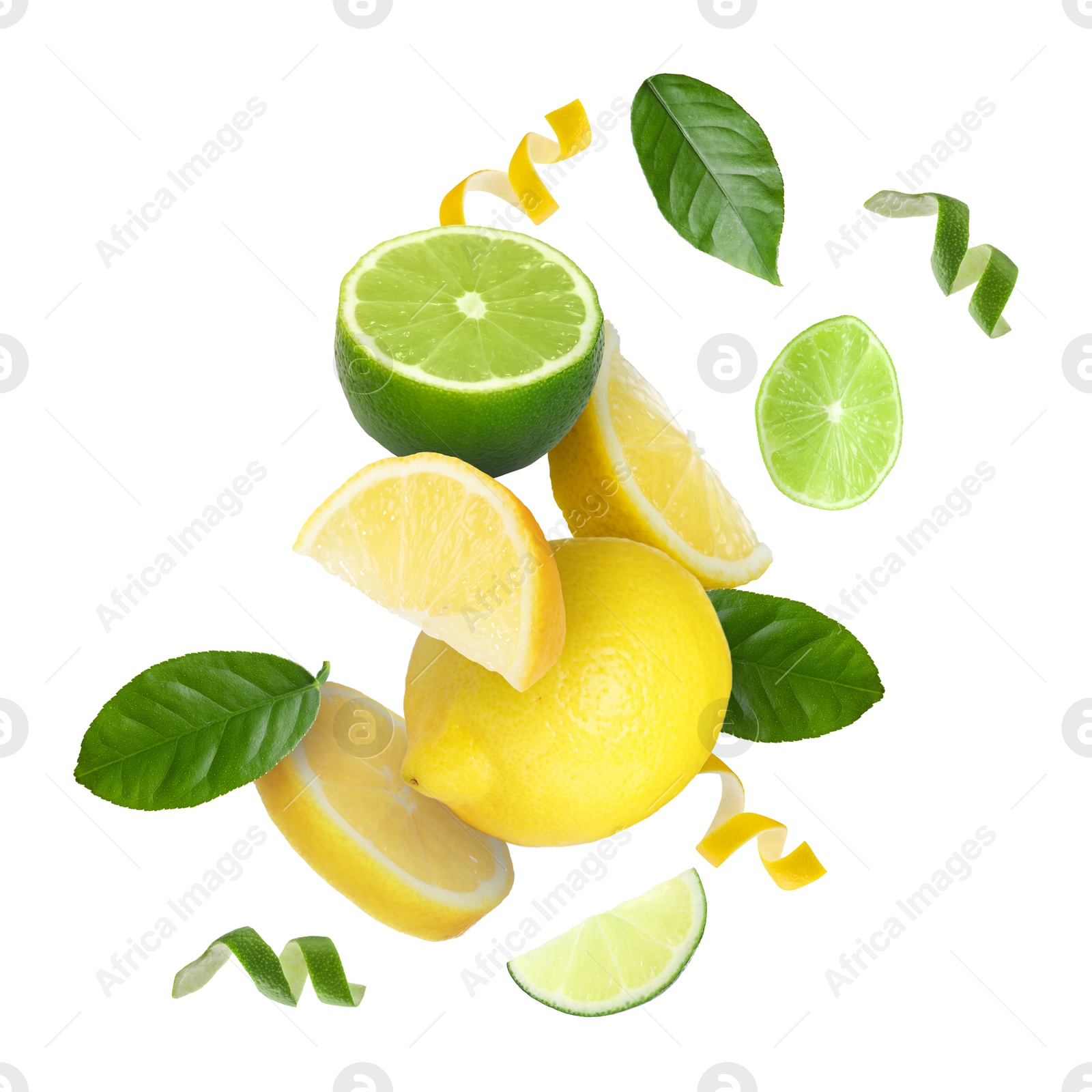 Lemon, lime, zest and green leaves in air on white background Image of Lemon, lime, zest and green leaves in air on white background