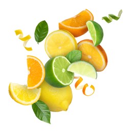 Image of Lime, lemon, orange, zest and green leaves in air on white background