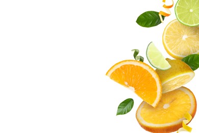 Image of Lime, lemon, orange, zest and green leaves in air on white background