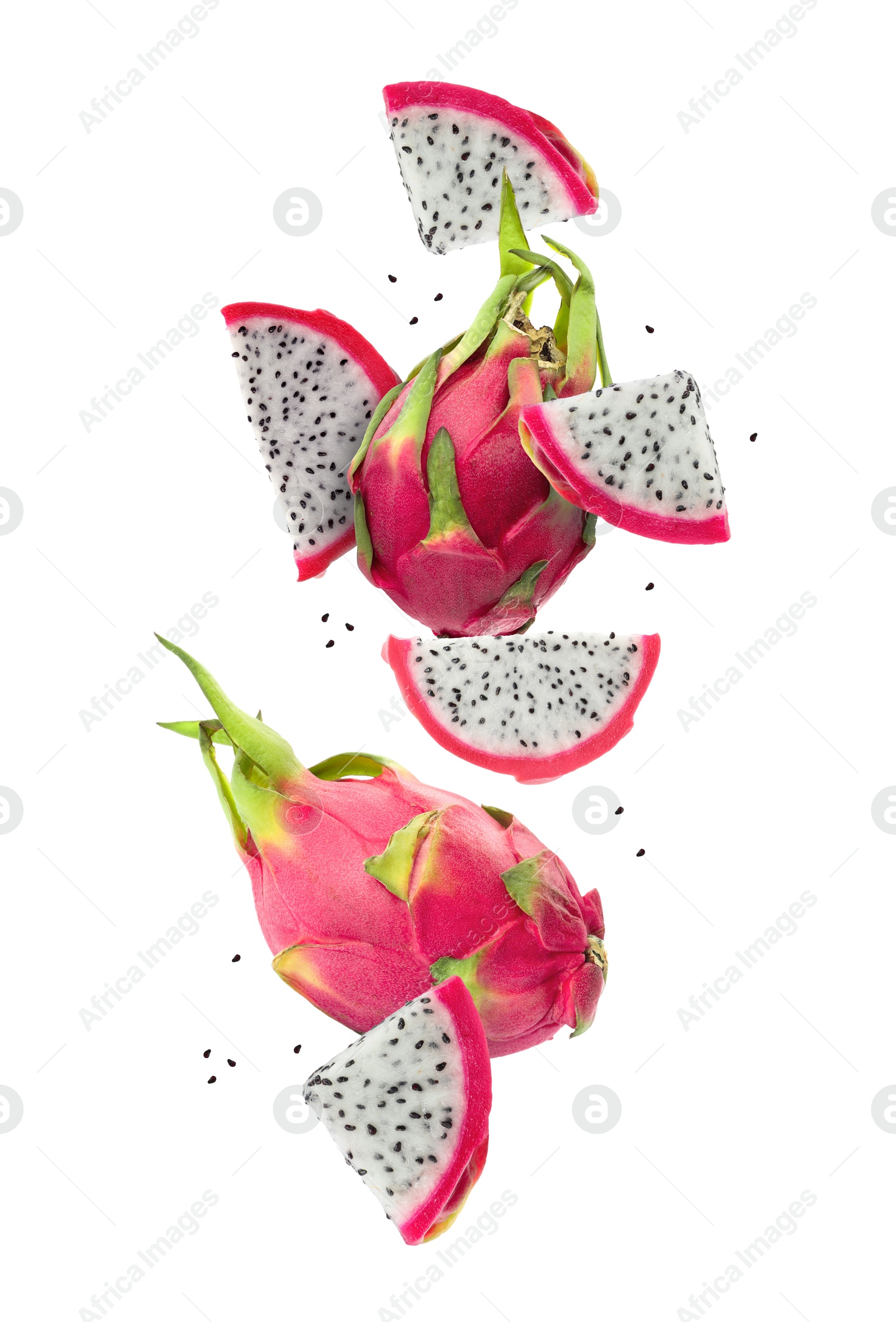 Image of Tasty pitaya fruits falling on white background