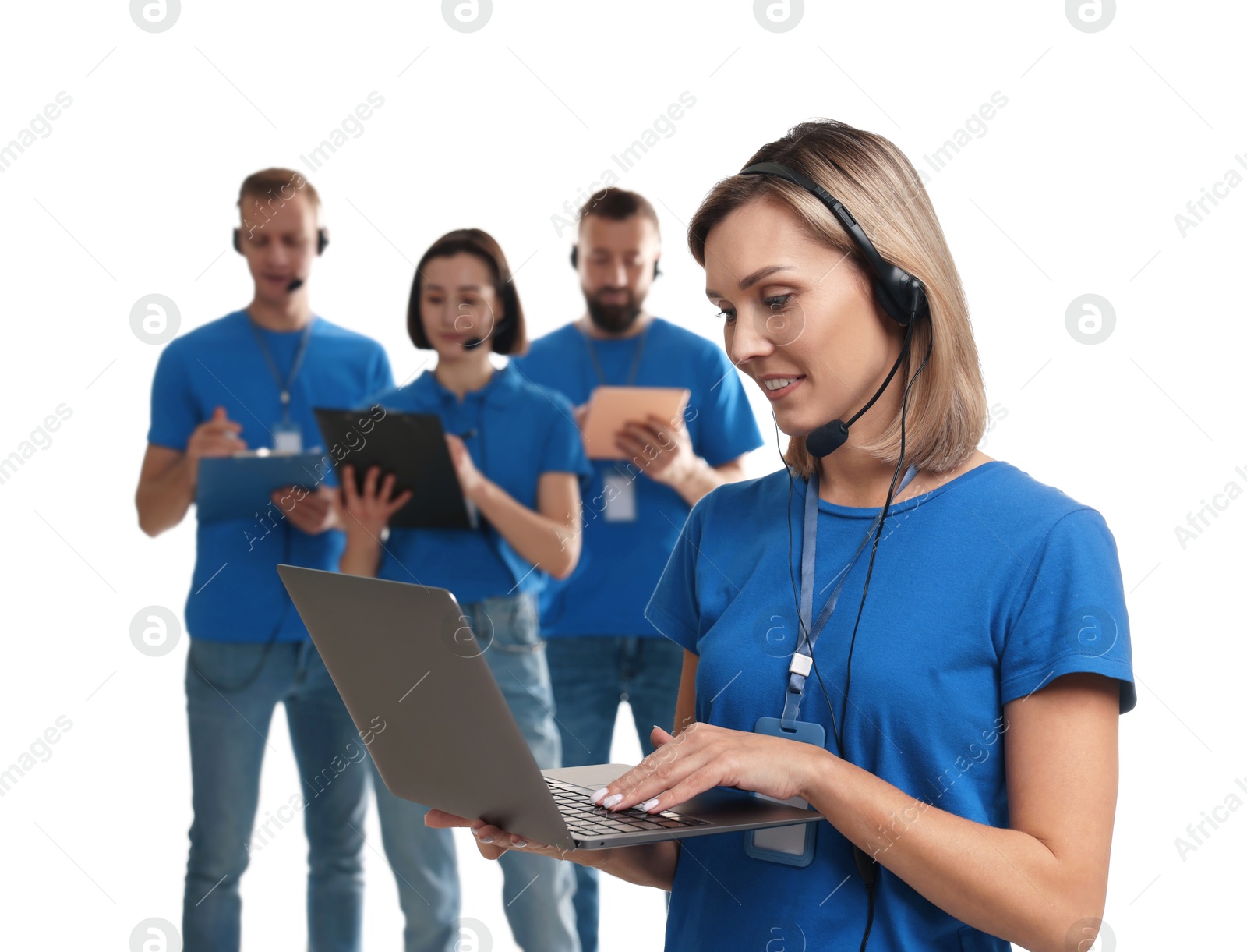 Photo of Technical support call center. Team of friendly operators on white background