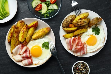 Photo of Flat lay composition with tasty brunch served on dark textured table