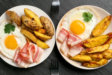 Photo of Flat lay composition with tasty brunch served on dark textured table