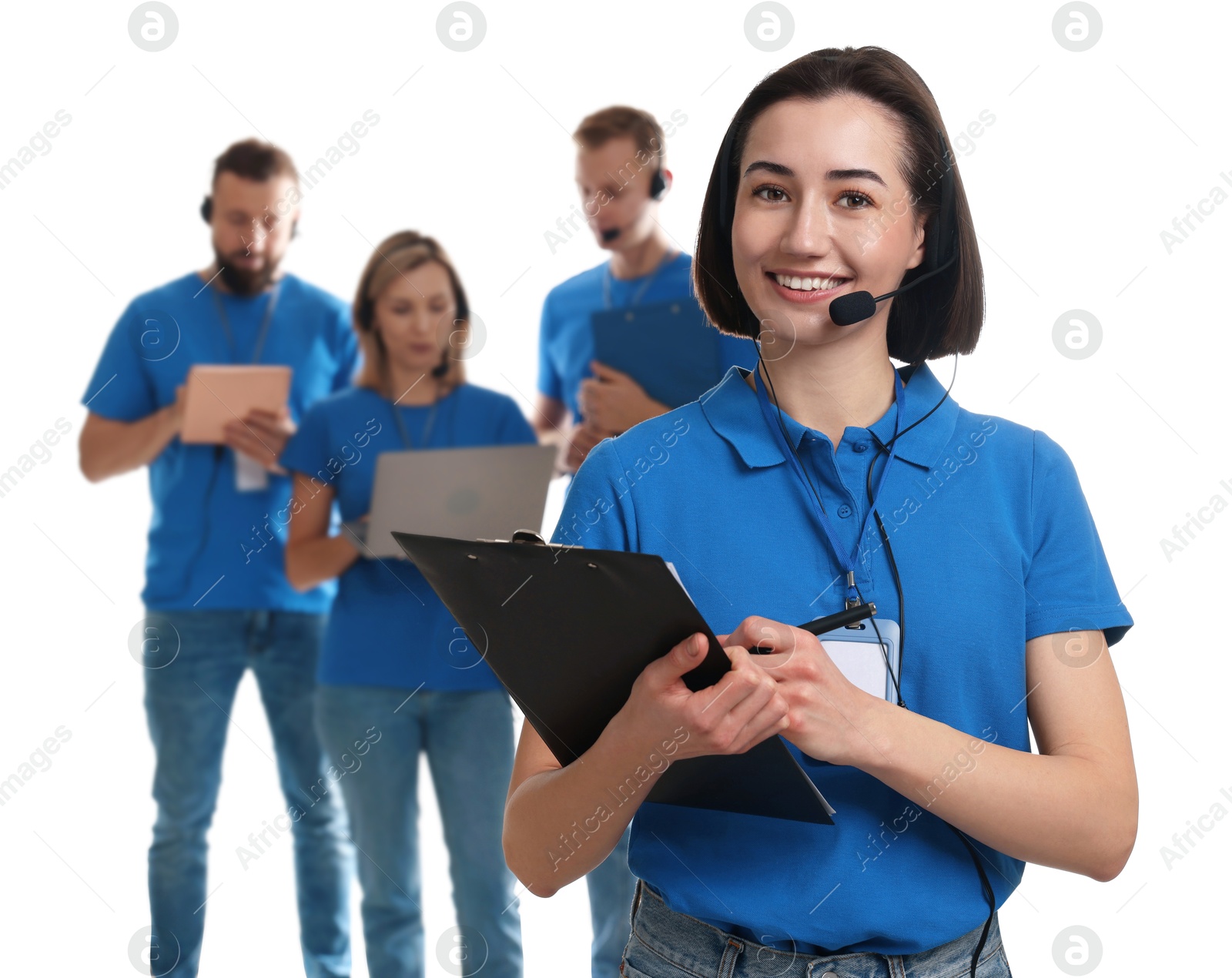 Photo of Technical support call center. Team of friendly operators on white background