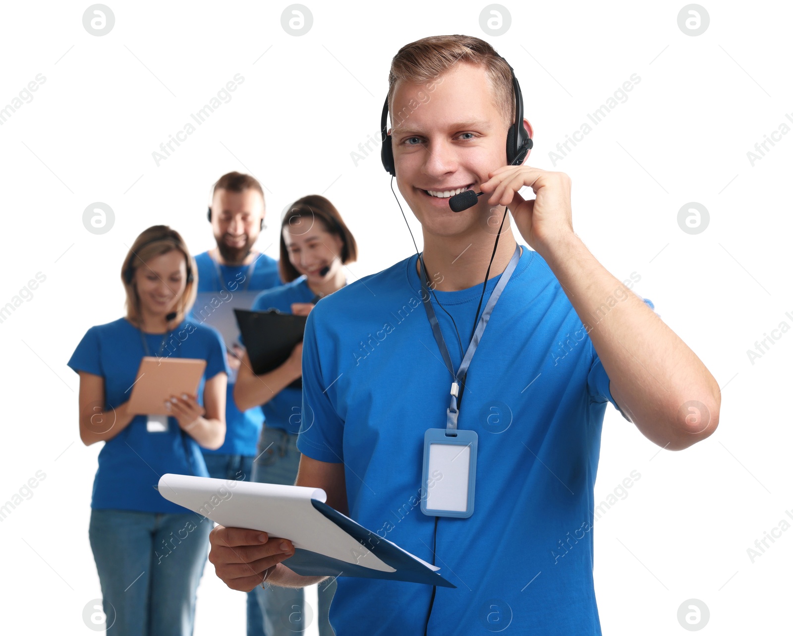 Photo of Technical support call center. Team of friendly operators on white background