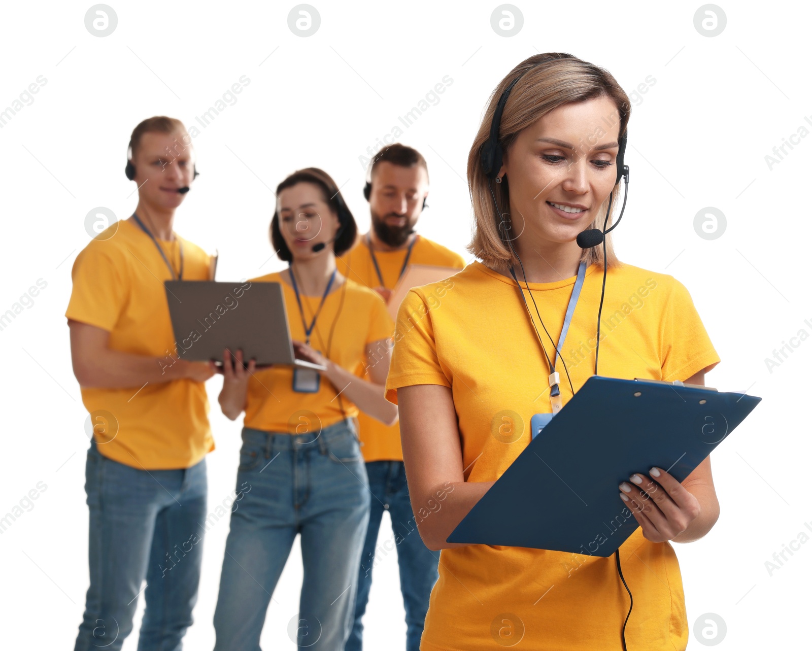 Photo of Technical support call center. Team of friendly operators on white background