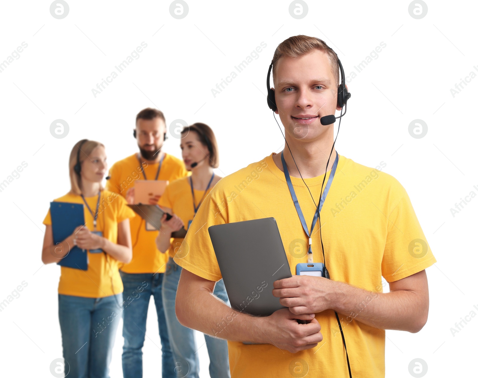 Photo of Technical support call center. Team of friendly operators on white background