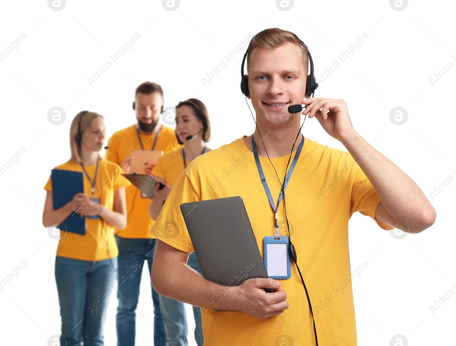 Photo of Technical support call center. Team of friendly operators on white background