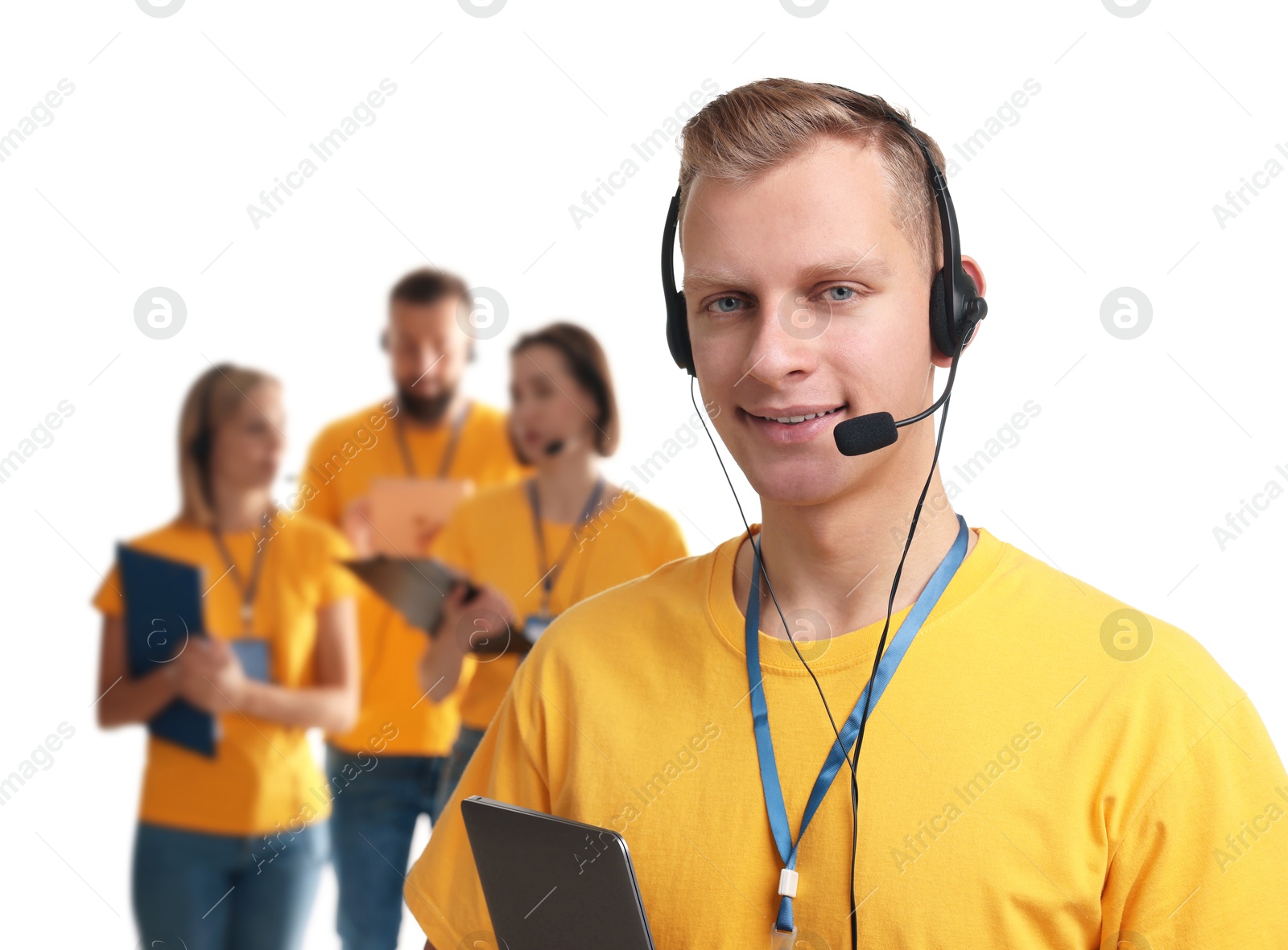 Photo of Technical support call center. Team of friendly operators on white background