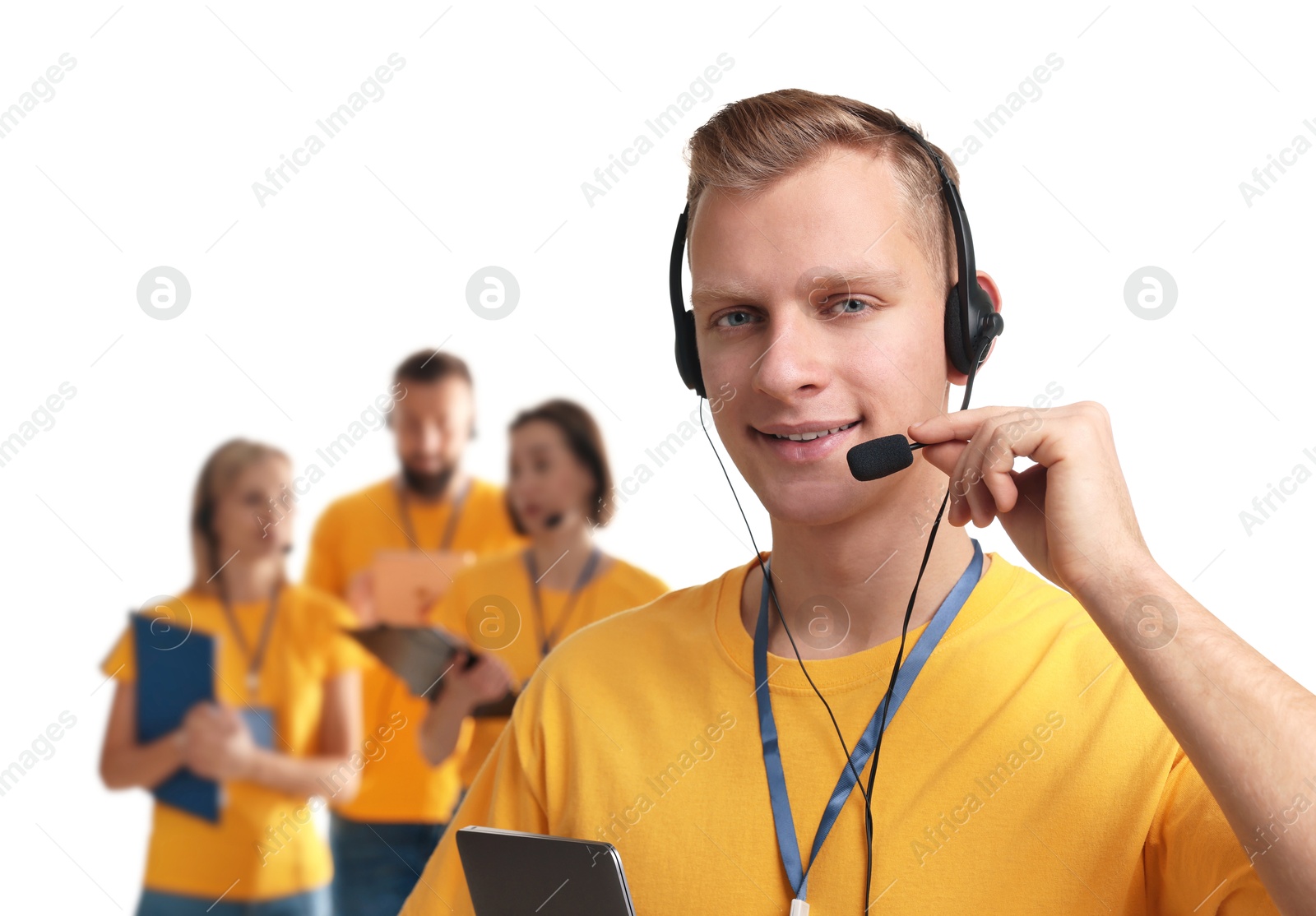 Photo of Technical support call center. Team of friendly operators on white background