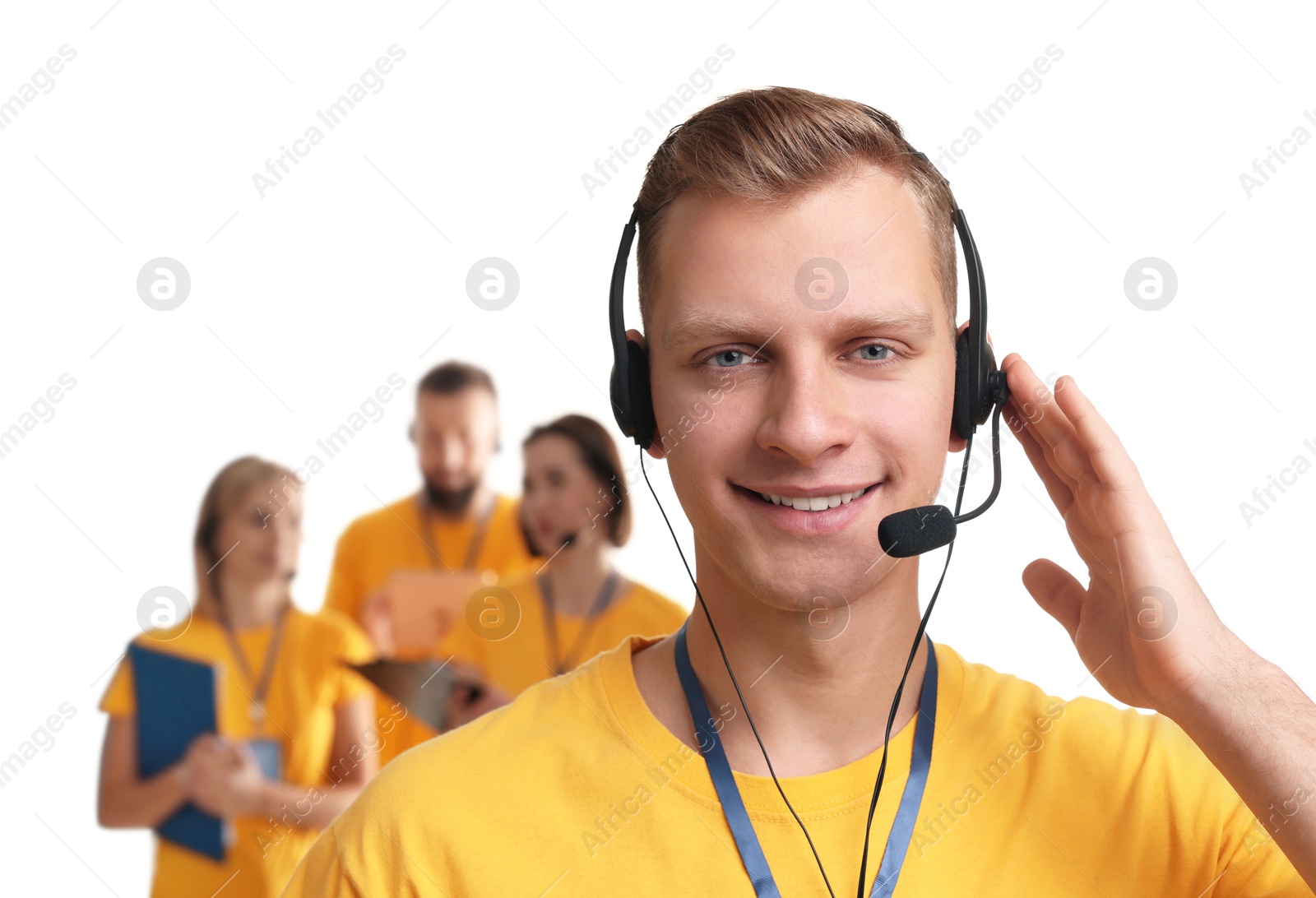 Photo of Technical support call center. Team of friendly operators on white background