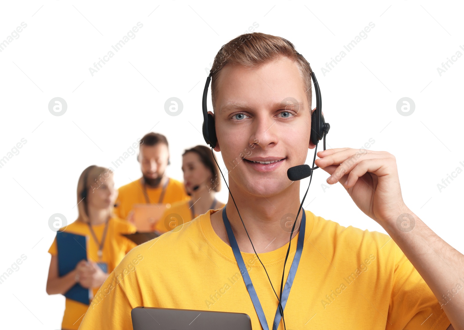 Photo of Technical support call center. Team of friendly operators on white background