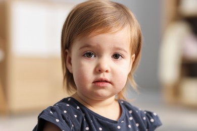 Photo of Portrait of cute little baby at home