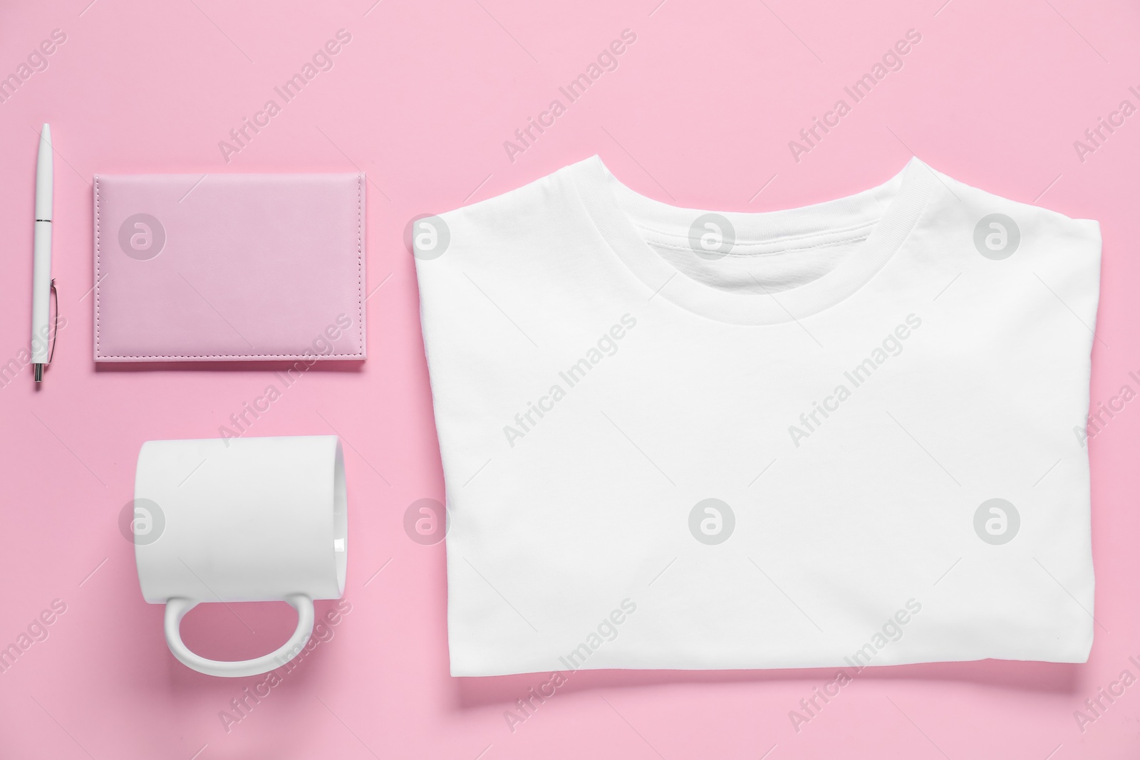 Photo of Different blank items for branding on pink background, flat lay. Mockup for design