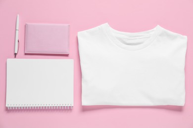 Photo of Different blank items for branding on pink background, flat lay. Mockup for design