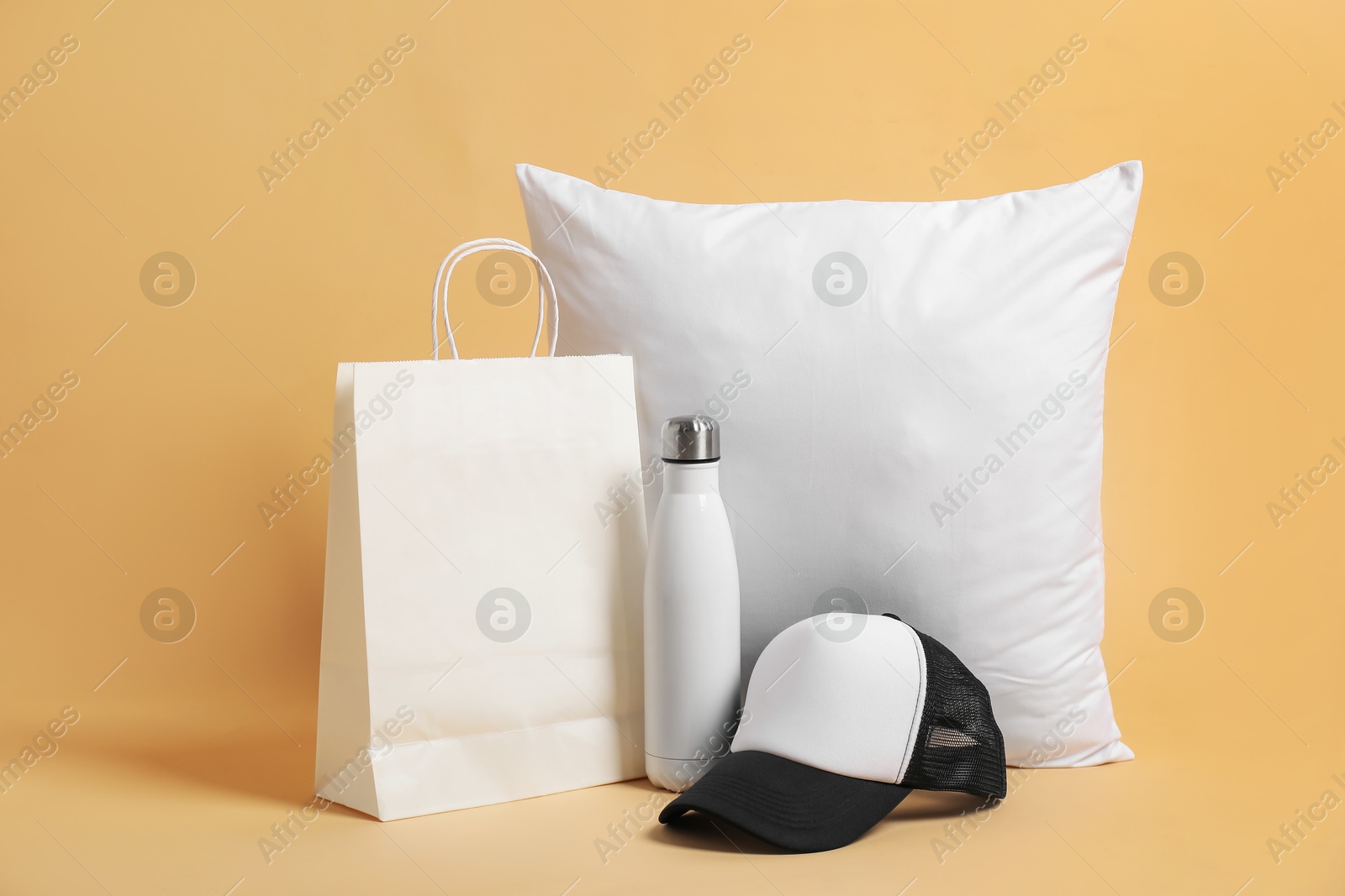 Photo of Different blank items for branding on beige background. Mockup for design