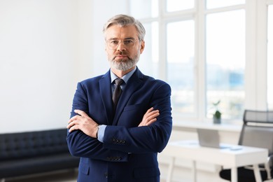 Photo of Banker with crossed arms in office, space for text