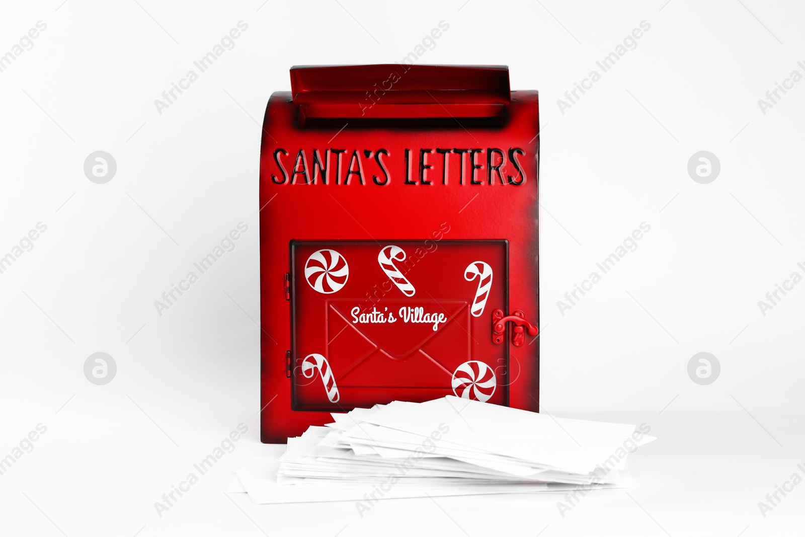 Photo of Santa Claus mail box and letters on white background. Christmas tradition