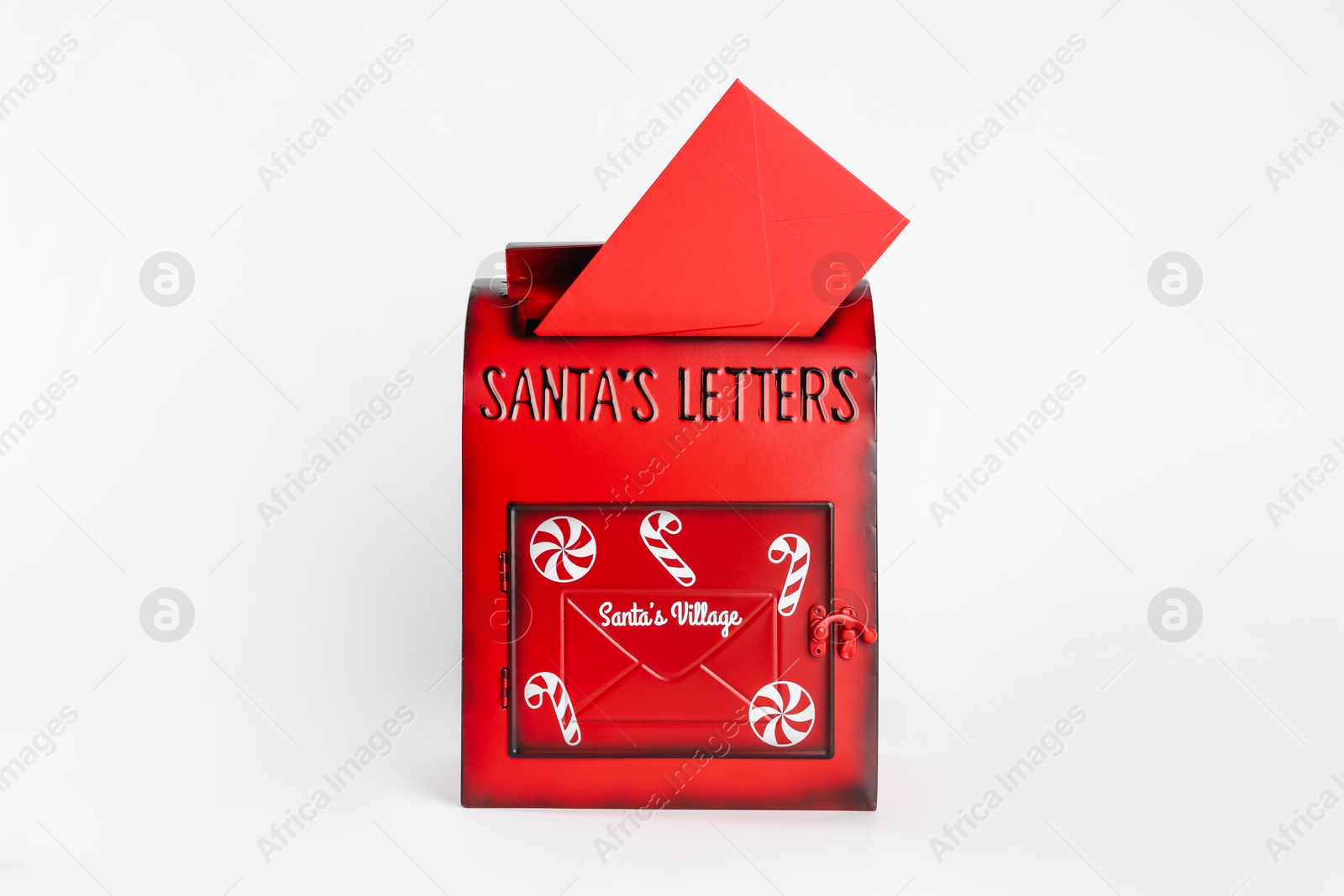 Photo of Santa Claus mail box with letter on white background. Christmas tradition