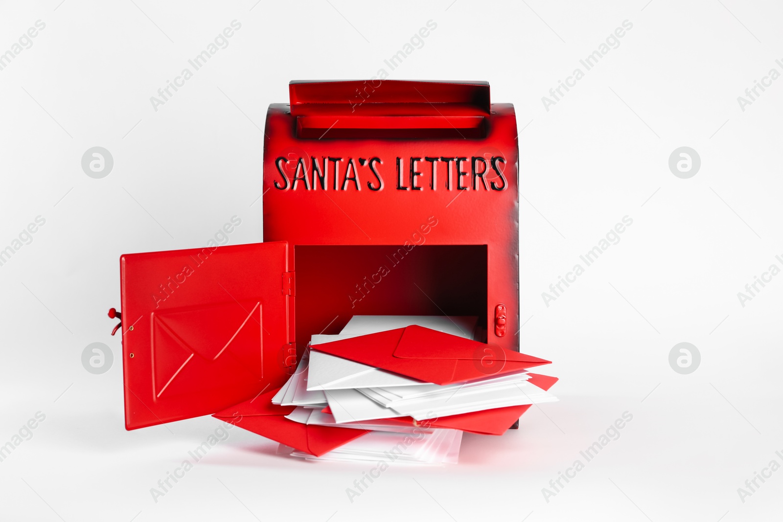 Photo of Santa Claus mail box with letters on white background. Christmas tradition