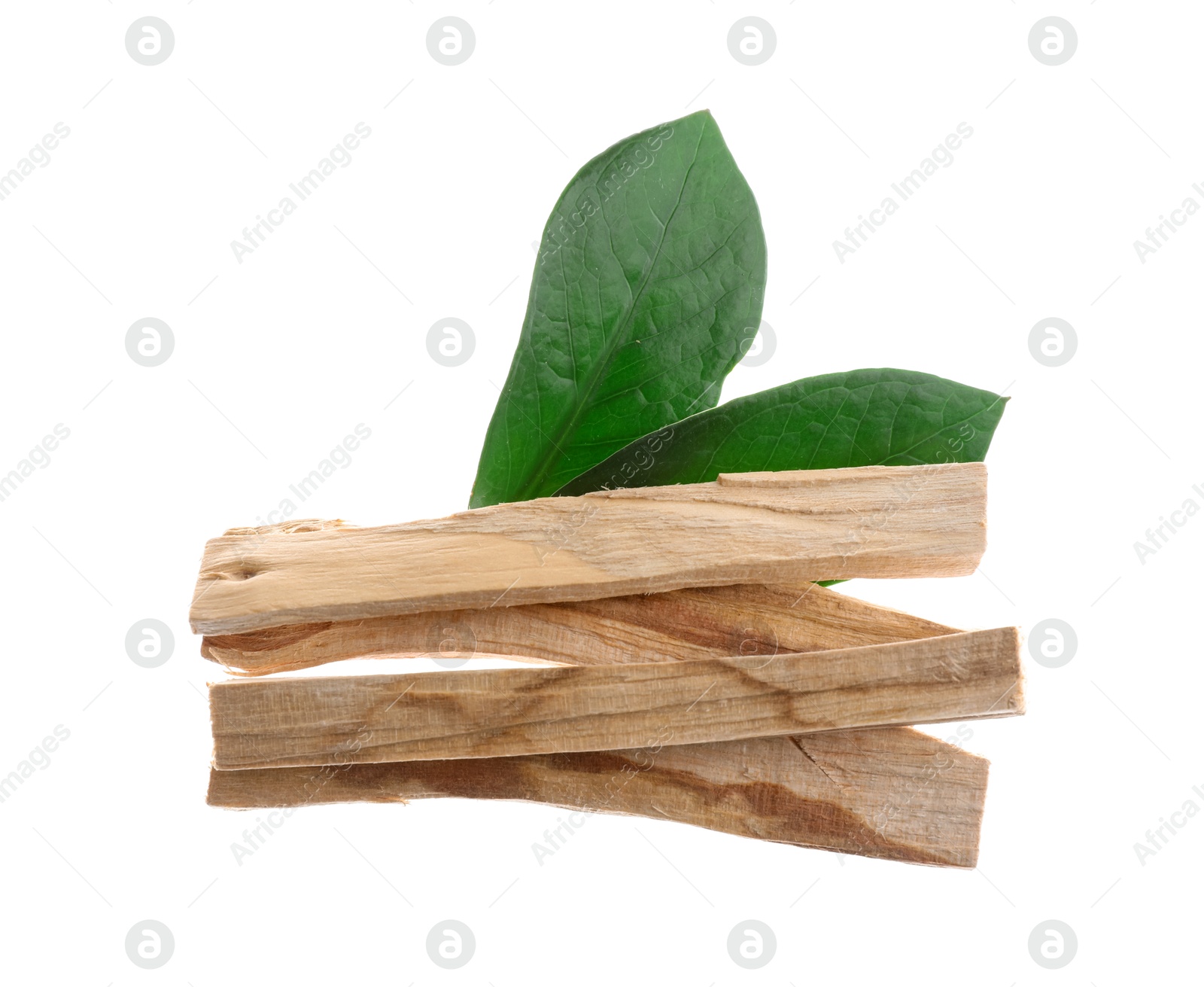 Photo of Palo santo sticks and green leaves on white background